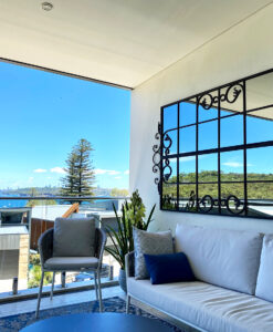 Beautiful wrought iron outdoor mirror Manly courtyard