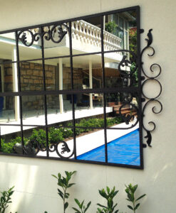 Iron garden mirror designef to be outdoors