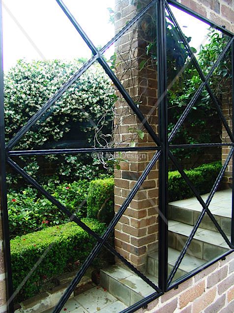 double cross garden mirror outdoor mirrors design repeats