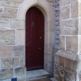 Church door in courtyard
