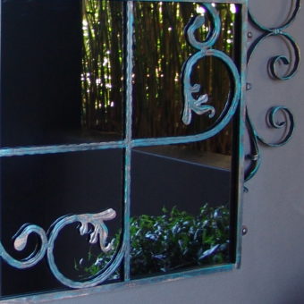 Scrolled gate mirror detail