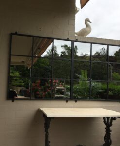 Outdoor mirror et of two in garden setting