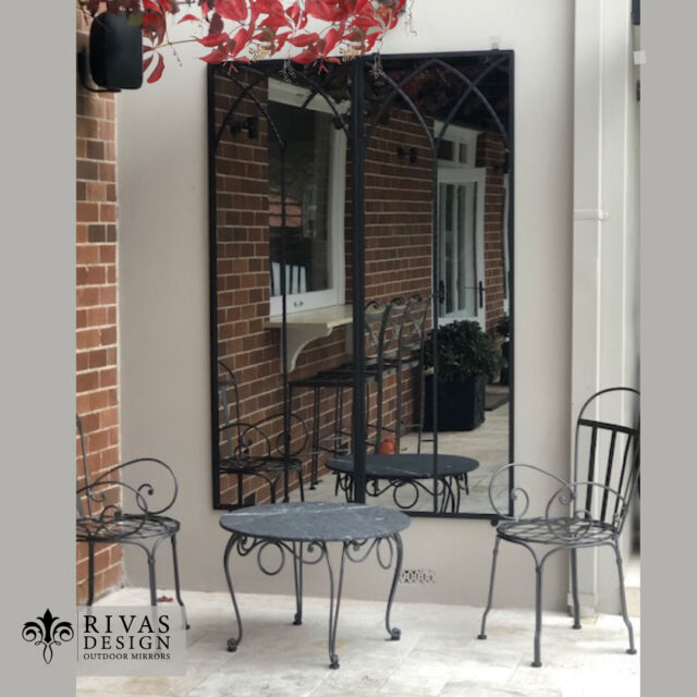 A pair of our double-arched mirrors on a blank wall creates the perfect backdrop and a sweet little spot to sit and reflect.⁠